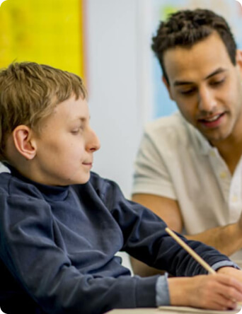Teen with autism studying
